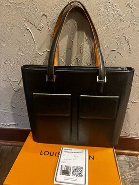 Louis Vuitton Embossed Leather handbag/tore with Tan Interior Trim